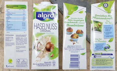 Alpro Haselnussmilch Verpackung und Glas