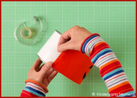 Anleitung: Keks-Aufbewahrung in Dosen mit Papierlagen (Schaubild)