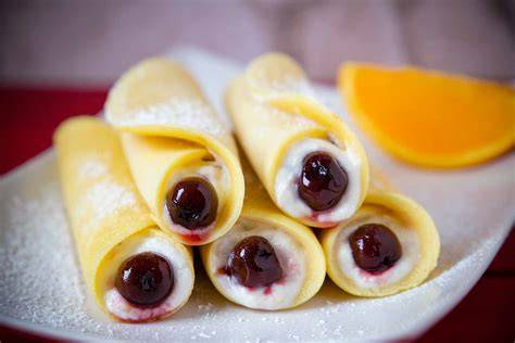 Apostelfinger - kleine italienische Pfannkuchenröllchen mit Ricottacreme