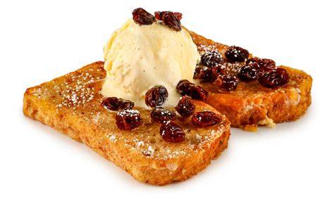 Arme Ritter mit Rum-Rosinen und Vanilleeis auf Teller