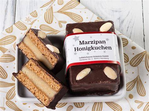 Aufbau eines Gin Dominosteins: Honigkuchen, Marzipan, Apfelgelee, Gin-Schicht