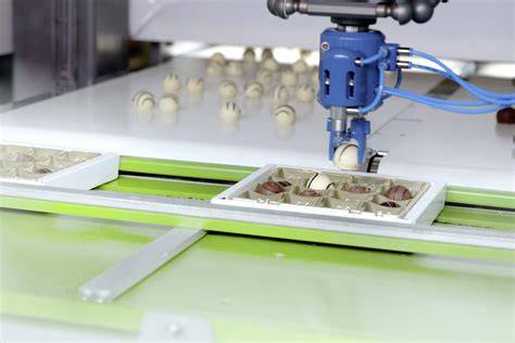 Automatisierte Verpackungslinie für Pralinen bei Wiebold