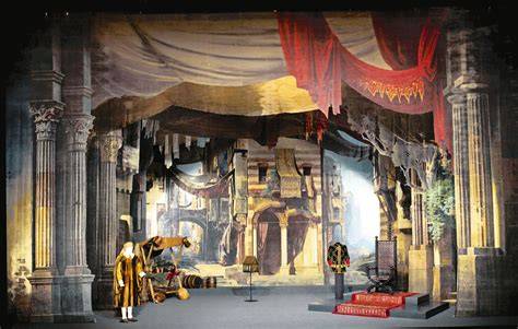 Bühnenbild: Intime Szene im Wohnzimmer der Familie Rosenbach (Theateraufnahme)