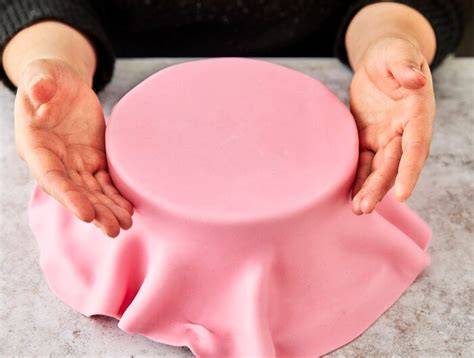 Babybauch-Torte rosa Schritt-für-Schritt Anleitung