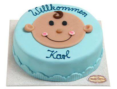 Babytorte in Hellblau mit Babykopf-Motiv