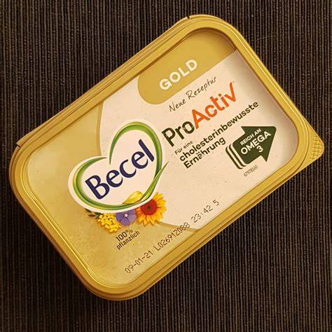 Becel Gold Packung, Nährwert-Icons und Backzutaten arrangiert