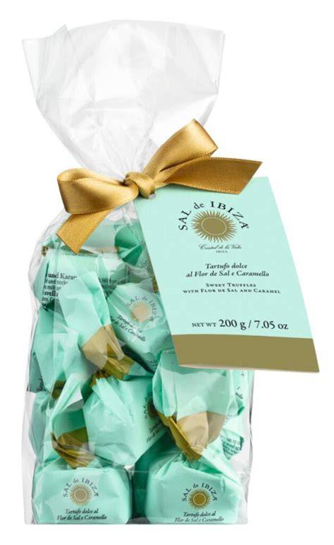Beutel und einzelne Praline mit Papageientaucher-Motiv
