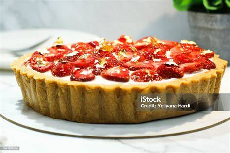 Bild: Erdbeeren als Topping auf Milchreistörtchen