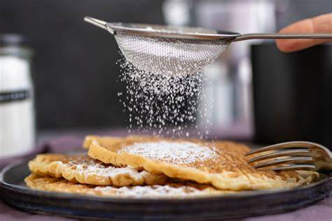 Biscuitwaffeln mit Puderzucker