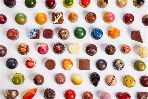 Bunte Auswahl der Hamann-Schokoladen, Pralinen und Plättchen