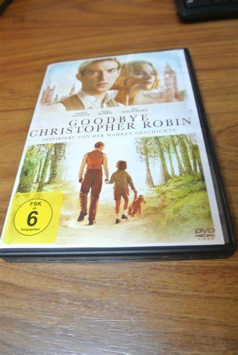 Christopher Robin mit seinen Stofftieren (historische Aufnahme)