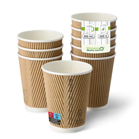 Coffee-to-go Becher und moderne Coffeeshop-Szene