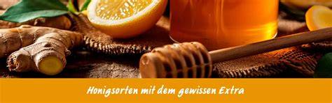 Daumengroßes Stück Ingwer mit Honiglöffel