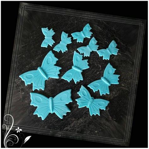 Dekorationsideen: Blumen, Schmetterlinge, Goldtaler, Kordel aus Fondant