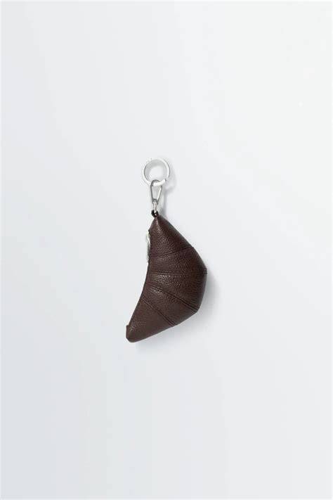Der Lemaire Mini Croissant Keyring als modisches Statement Piece