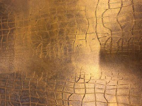 Detail des Baisers: goldbraune, dekorative Oberfläche