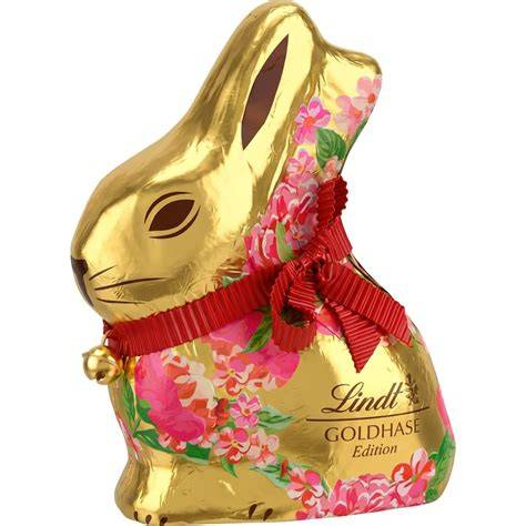 Detailaufnahme Lindt Goldhase - Glöckchen, rote Schleife, Goldfolie