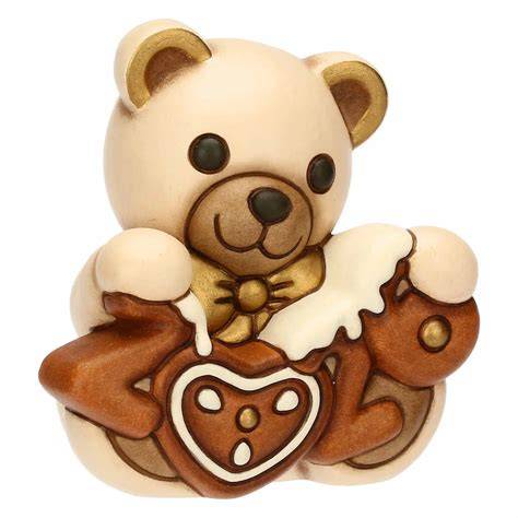 Detailaufnahme eines Lebkuchen-Design-Kissens mit Zuckerguss-Muster