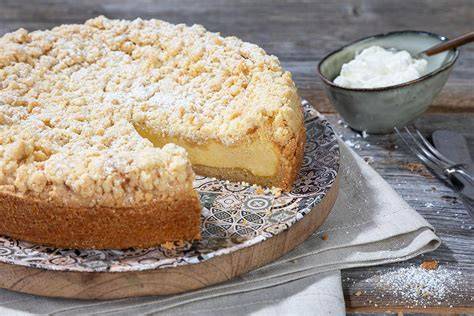Detaillierte Zutatenaufstellung für Käsekuchen mit Streuseln