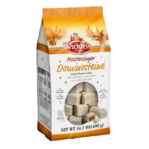 Dominosteine mit weißer Schokolade auf Teller