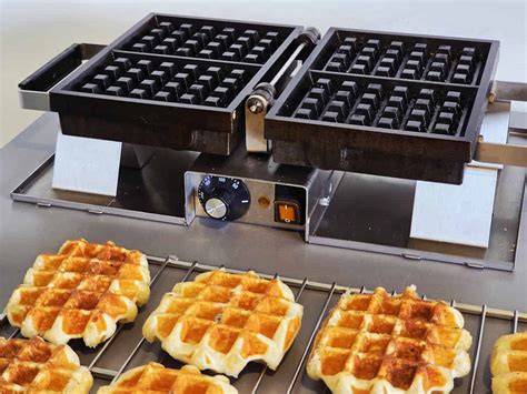 Ein Waffeleisen in Benutzung
