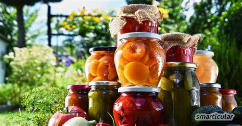 Einkochen und Befüllen der Gläser mit Orangen-Löwenzahn Marmelade