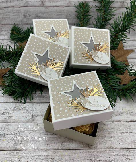 Elegante Pralinenauswahl in Geschenkboxen, Nahaufnahme