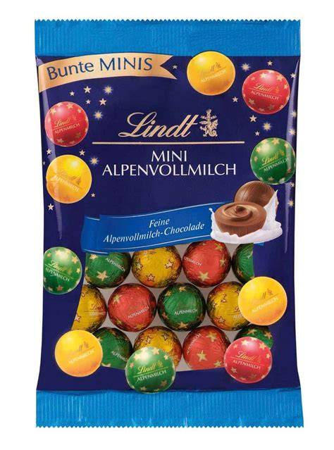 Festliche Präsentation von Lindt Mini Kugeln auf dem Weihnachtsteller