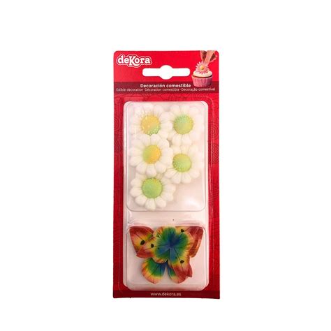 Fixieren von Zuckerblumen mit Zuckerkleber und Zahnstocher am Tortenkuchen