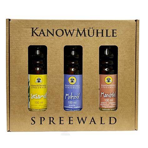 Fläschchen mit Sesamöl, Mohnöl und Mandelöl in einer Dessertbox