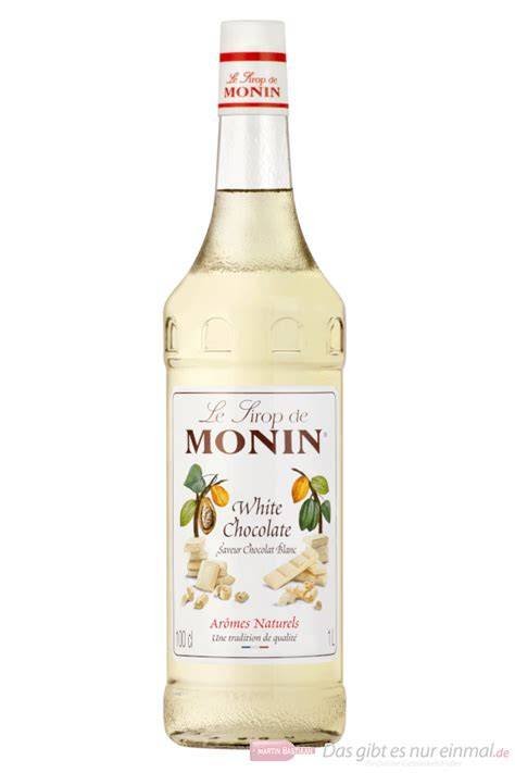 Flasche Monin Weiße Schokolade Sirup auf Holzuntergrund