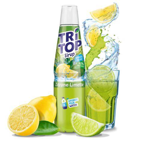 Flasche Tri Top Sirup und Glas mit Kirschlimonade