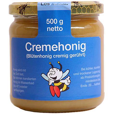 Foto: Cremig gerührter Honig, schmalzige Konsistenz im Glas