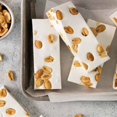 Foto von selbstgemachten Nougat-Stücken in Silikonformen