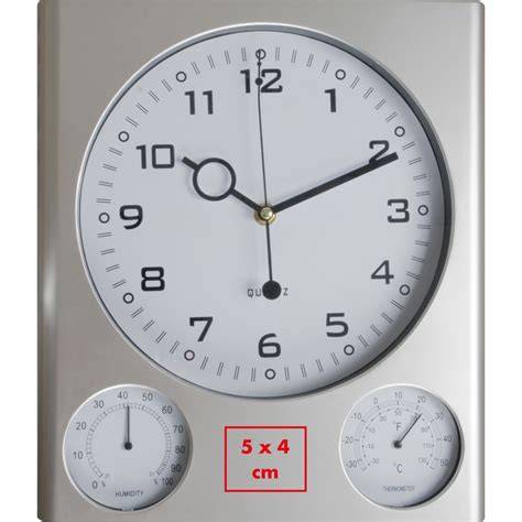 Fotoidee: Fondanttorte in Karton im Kühlschrank, Hygrometer und Thermometer
