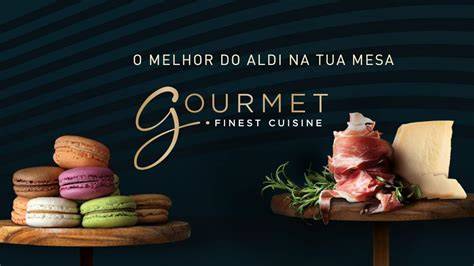 GOURMET FINEST CUISINE Sortiment auf einer Tafel mit Marmeladengläsern und Feinkost