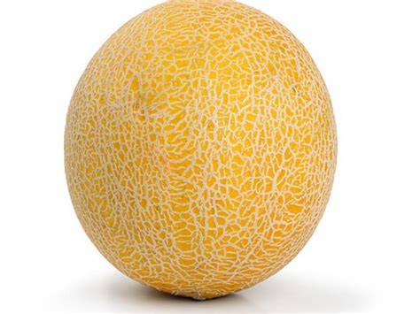 Galia Melone, frisches Obst, Brot und Marmeladengläser als Arrangement