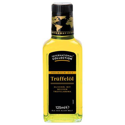 Geöffnete Flasche Trüffelöl in dunkler Lagerung