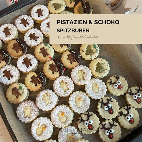Gefüllte Schoko-Spitzbuben auf Teller