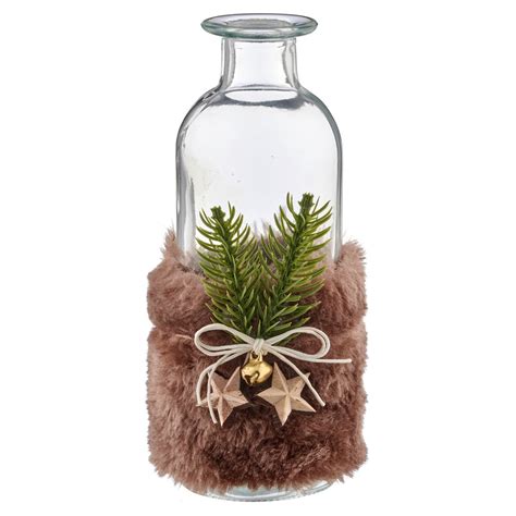 Geschenkflasche mit Orangen-Eierlikör und weihnachtlicher Deko