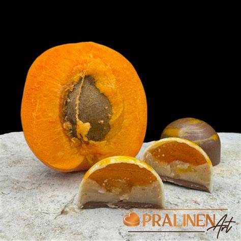 Glänzende temperierte Pralinen vs. graue Fehlstellen