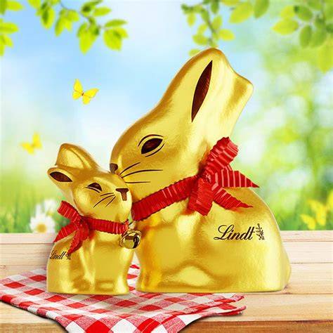 Glöckchen und rote Schleife am Lindt Goldhasen