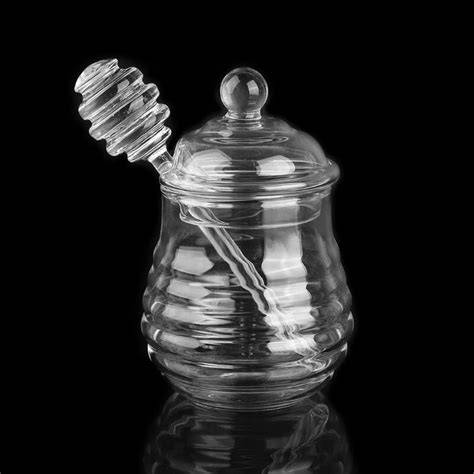 Glas Honig und Löffel
