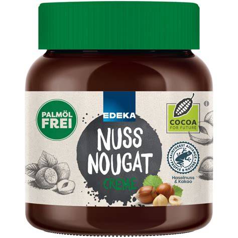 Glas Nuss-Nougat-Creme ohne Palmöl auf Frühstückstisch