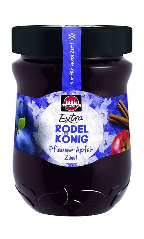 Glas Schwartau Rodelkönig Marmelade auf Frühstückstisch