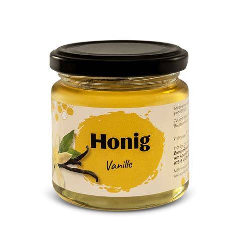Glas Vanillehonig mit Vanilleschote und Honigdipper