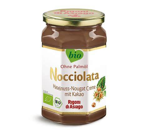 Glas geöffnetes Nuss-Nougat-Aufstrich mit Brot