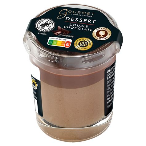 Glas mit Trüffelscheiben und Etikett Gourmet Finest Cuisine