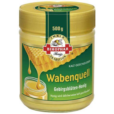 Glas mit cremigem Wabenquell Gebirgsblütenhonig