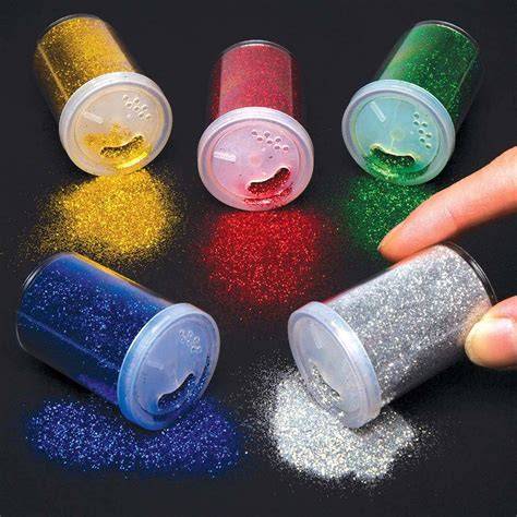 Glitzerpulver-Dosen in verschiedenen Farben